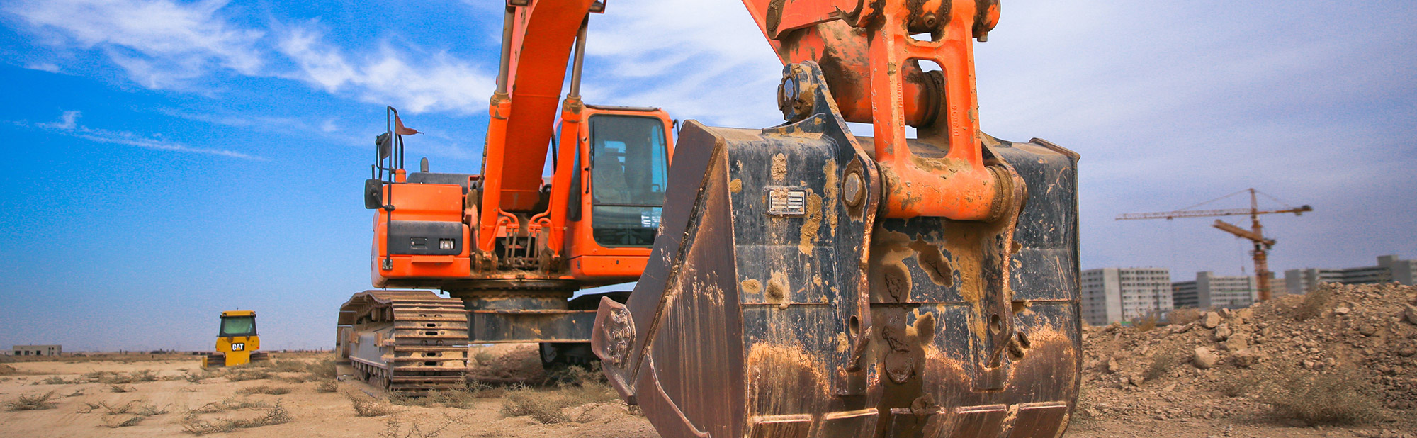Image of an excavator digging